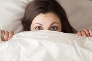 woman-hiding-because-she-had-a-nightmare